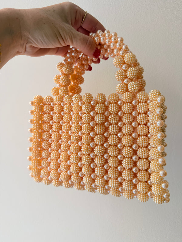 Petit sac en perles rosées